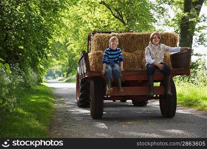 Two Boys on Tractor Trailer