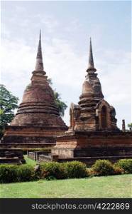 Two brick stupas in old Sukhotai, Thailand