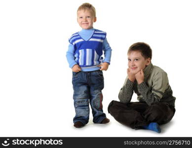 Two brothers. Age of 3 and 7 years. It is isolated on a white background