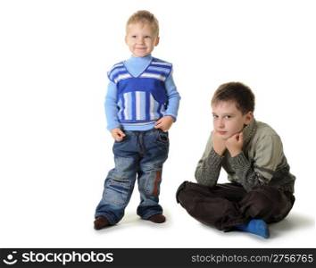 Two brothers. Age of 3 and 7 years. It is isolated on a white background
