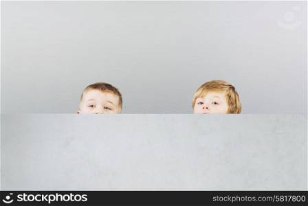 Two brothers hiding themselves during great game