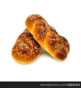 Two buns with sesame seeds on a white background.