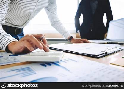 two Business executives partner analysis data document with accountant at office place