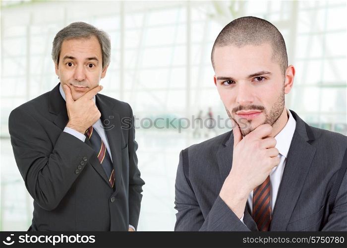two business men portrait at the office