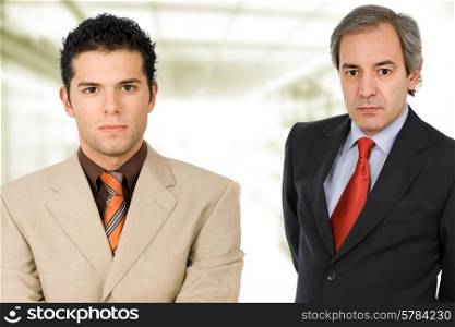 two business men portrait at the office