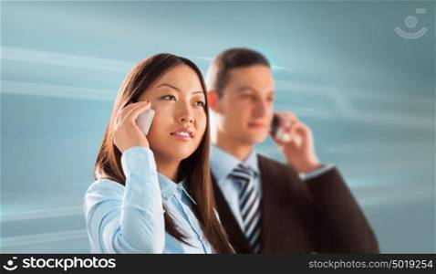 Two business people man and woman standing together and talking by phone on technological background
