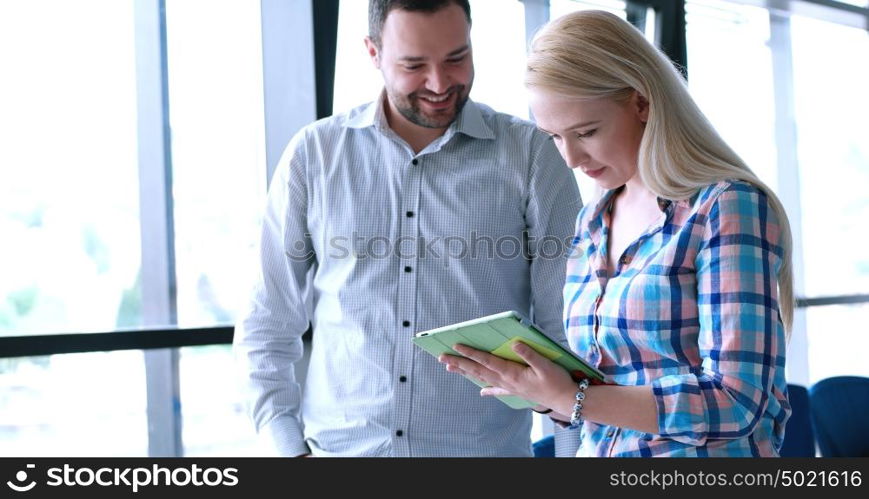 two business people preparing for next meeting and discussing ideas
