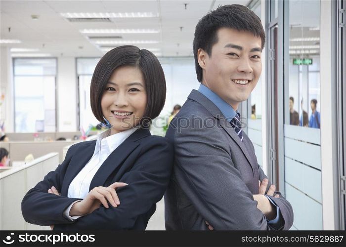Two Business People with Arms Crossed