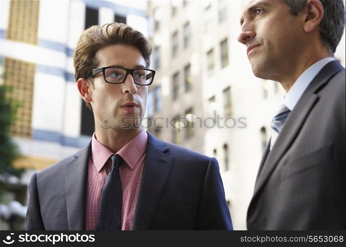 Two Businessman Chatting Outside Office