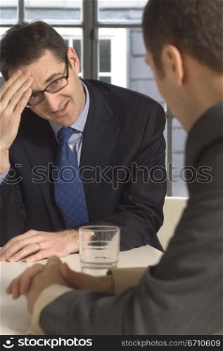 Two businessmen in a meeting
