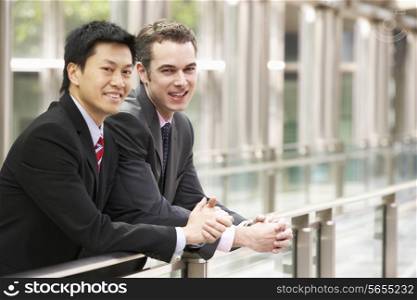 Two Businessmen Outside Modern Office