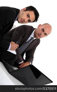 Two businessmen preparing meeting