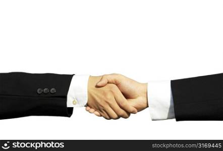 Two businessmen shaking hands in isolated white
