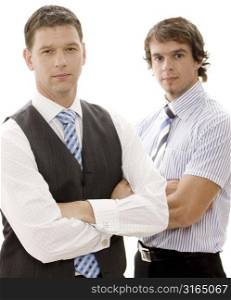 Two businessmen standing with their arms crossed