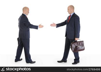 Two businessmen stretched out their hands for a handshake. Isolated on white background