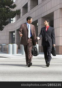 Two Businessmen Walking