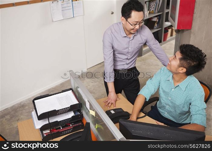 Two businessmen working in the office
