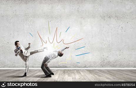 Two businesspeople in anger fighting with each other. Extreme quarrel