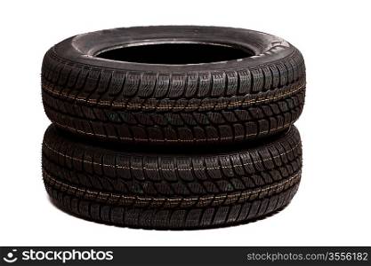 Two car tires isolated on white background