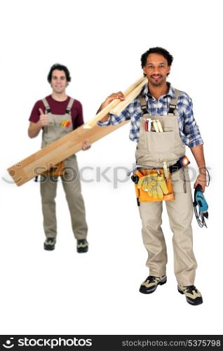 Two carpenters working together