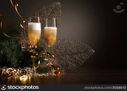 Two champagne glasses ready to bring in the New Year