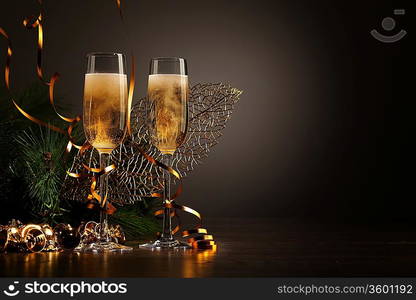 Two champagne glasses ready to bring in the New Year