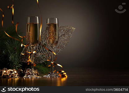 Two champagne glasses ready to bring in the New Year