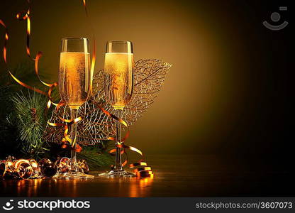 Two champagne glasses ready to bring in the New Year