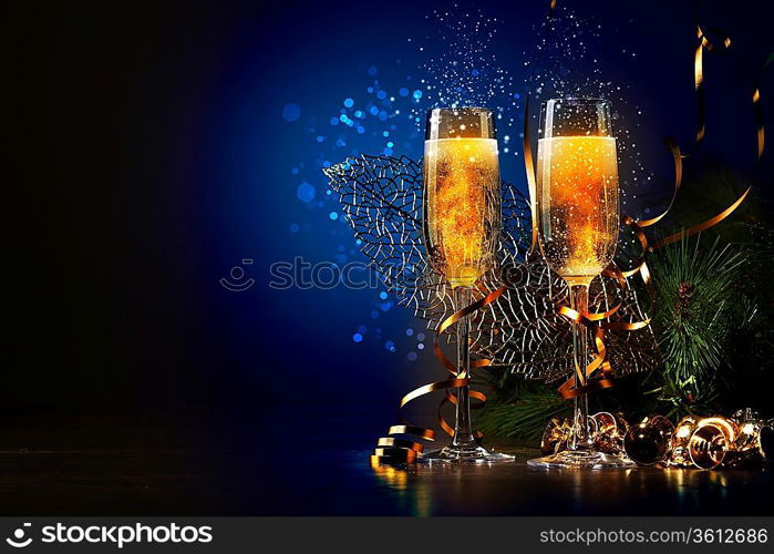 Two champagne glasses ready to bring in the New Year