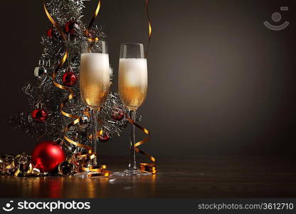 Two champagne glasses ready to bring in the New Year