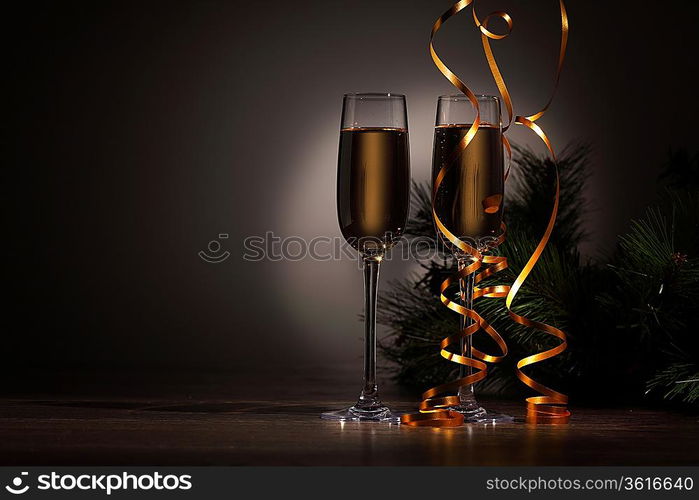 Two champagne glasses ready to bring in the New Year