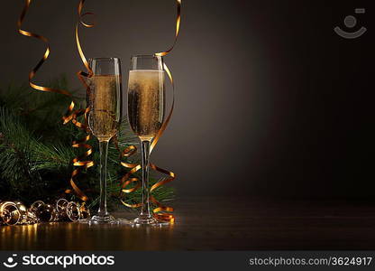 Two champagne glasses ready to bring in the New Year