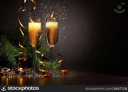 Two champagne glasses ready to bring in the New Year