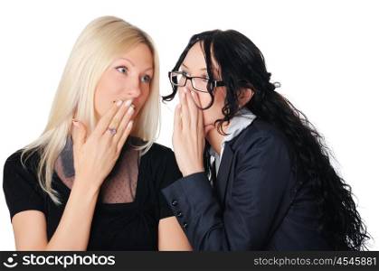 two charming business women whispering to each other
