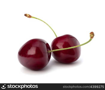 Two cherry berries isolated on white background