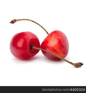 Two cherry berries isolated on white background