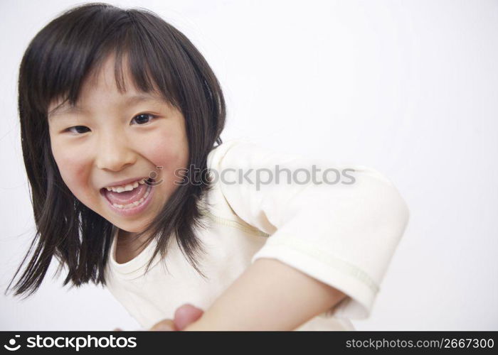 two children arm wrestling