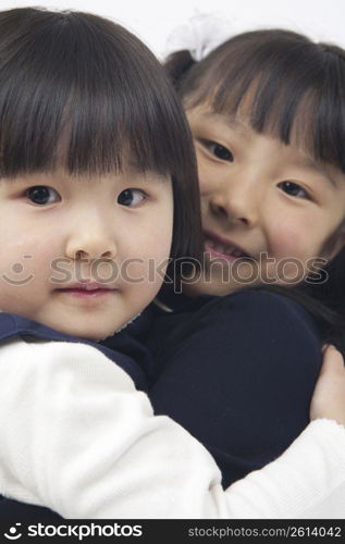 two children smiling