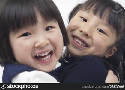 two children smiling