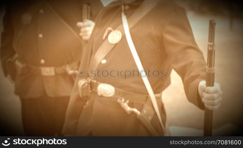 Two Civil War soldiers leaning on their rifles (Archive Footage Version)