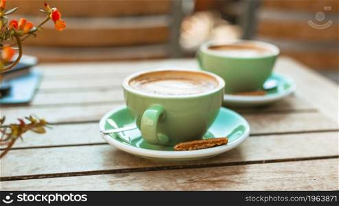two coffee cup wooden table. High resolution photo. two coffee cup wooden table. High quality photo