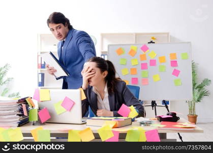 Two colleagues employees working in the office 