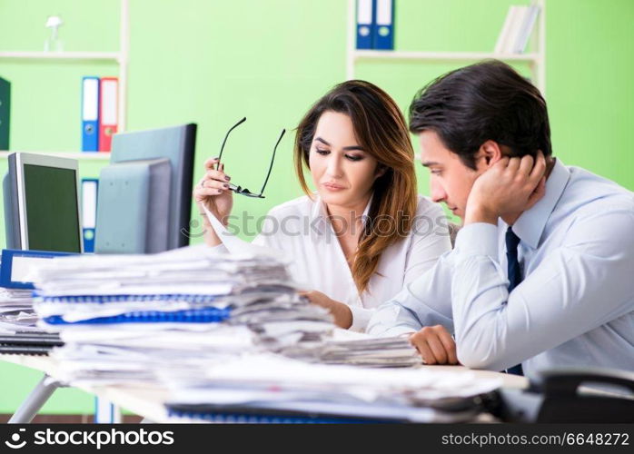 Two colleagues working in the office