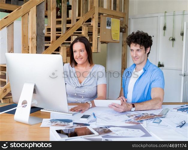 Two collegues having discussion in office