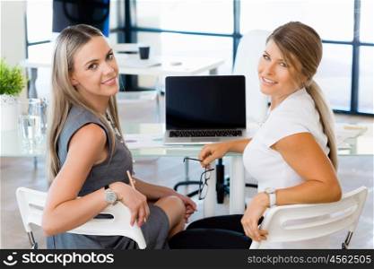 Two collegues in an office