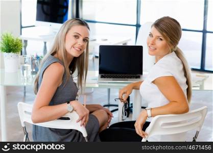 Two collegues in an office