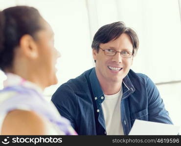 Two collegues working together in a office