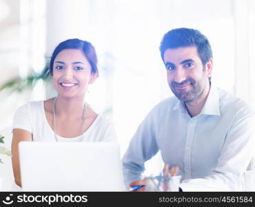 Two collegues working together in an office