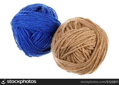 Two colored woolen balls on a white background