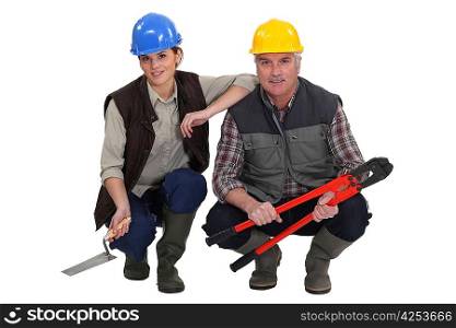Two construction workers.